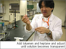 Add toluenen and heptane and adjust until solution becomes transparent